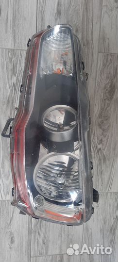 Фара передняя левая lancer 10