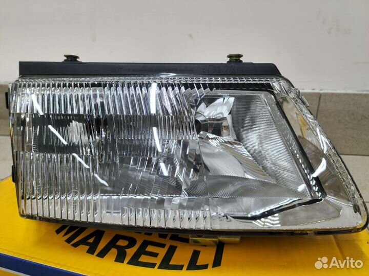 Передняя новая Hella фара VW Passat B5 (Без птф) R