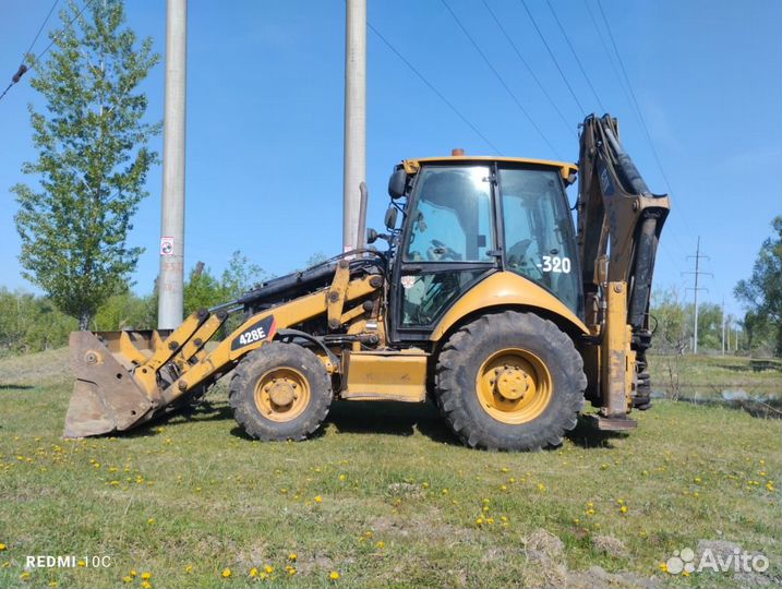 Экскаватор-погрузчик CAT 428E, 2011