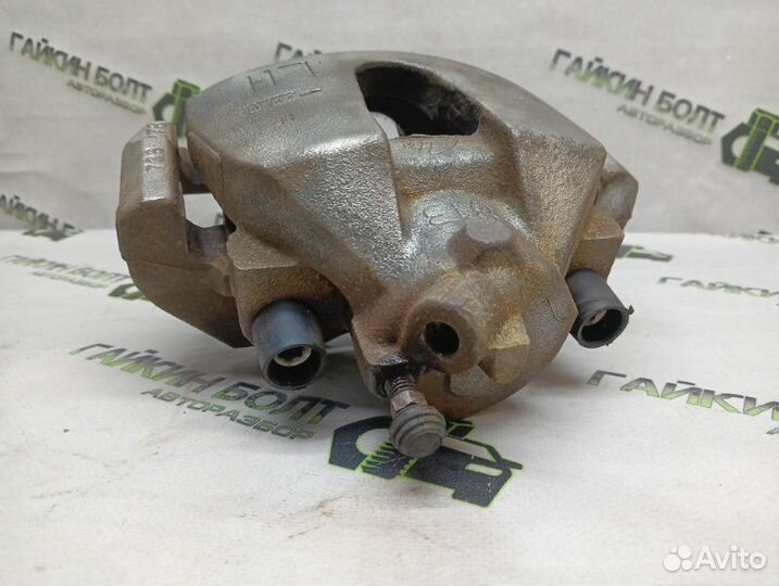Суппорт тормозной передний левый Ford Focus
