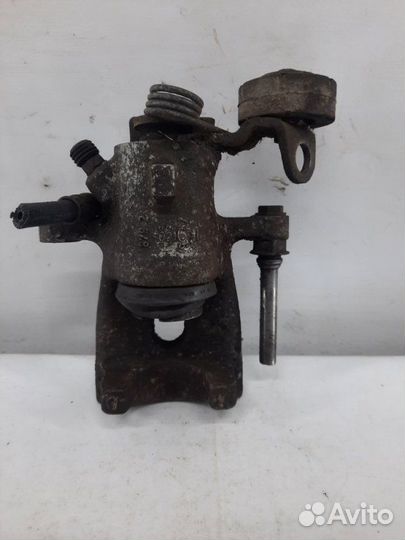 Суппорт тормозной задний правый Opel Zafira A