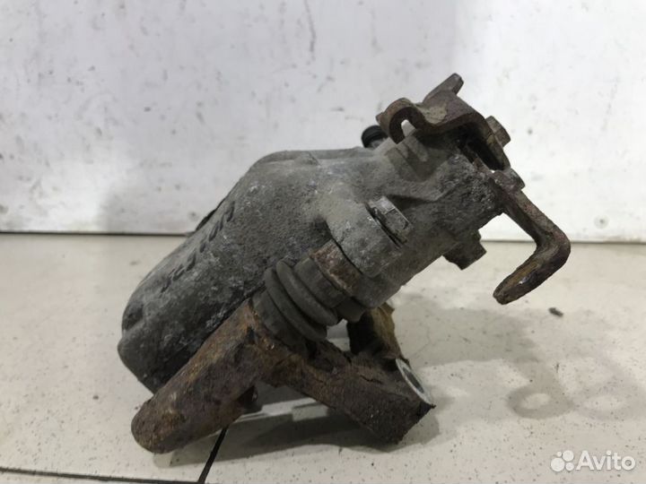 Суппорт задний левый