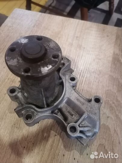 Помпа lancer 9, 4g18. Б/У