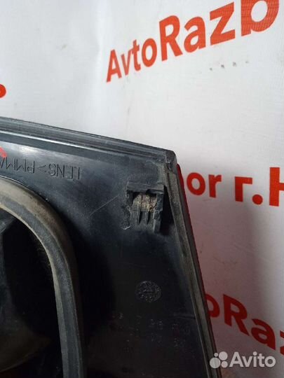 Фонарь правый Mitsubishi Carisma лифтбек