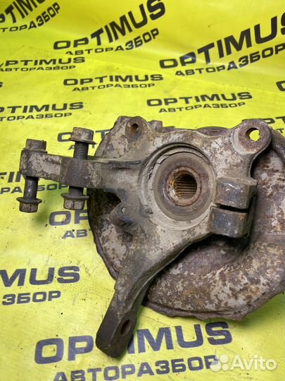 Кулак поворотный передний левый Mitsubishi Lancer