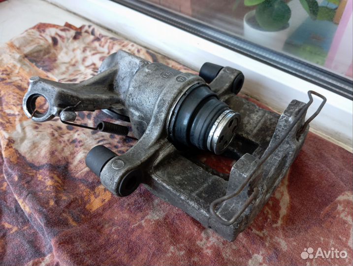 Суппорт задний правый Opel Vectra C