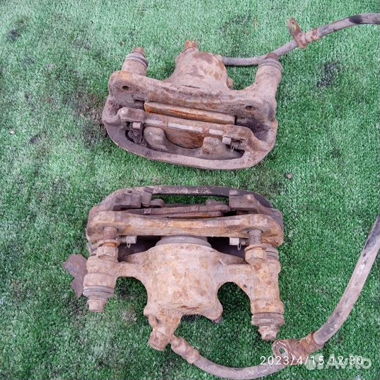 Суппорт тормозной Toyota Corsa