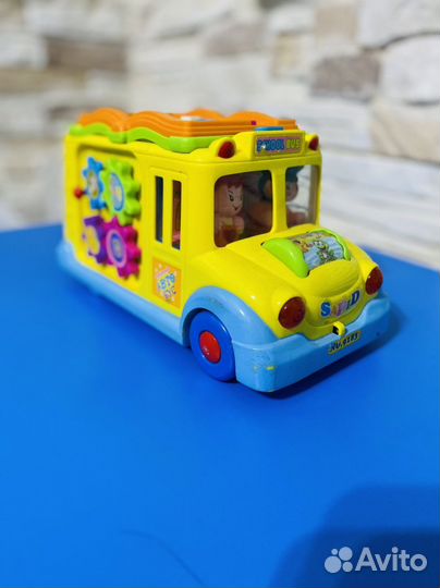 Игрушка музыкальный автобус