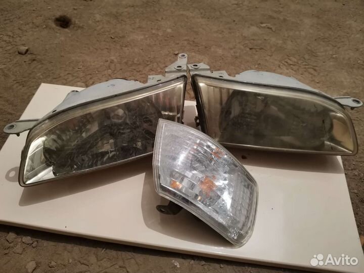 Фара Corolla AE110