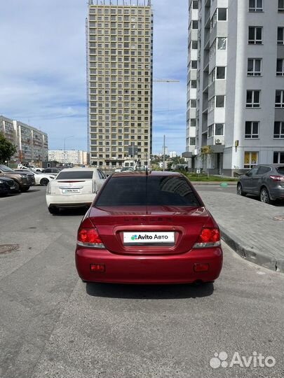 Mitsubishi Lancer 1.6 МТ, 2004, битый, 243 000 км