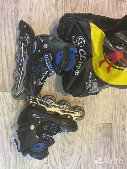 Роликовые коньки