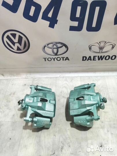 Суппорт тормозной передний Toyota Auris NZE151