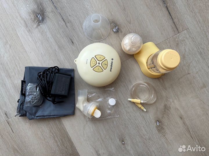 Молокоотсос электрический medela swing