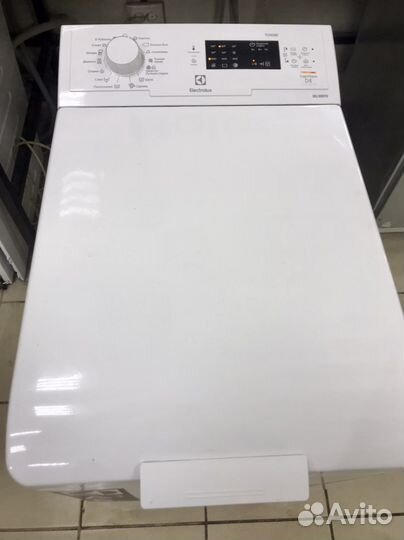 Стиральная машина с вертикальной загрузкой