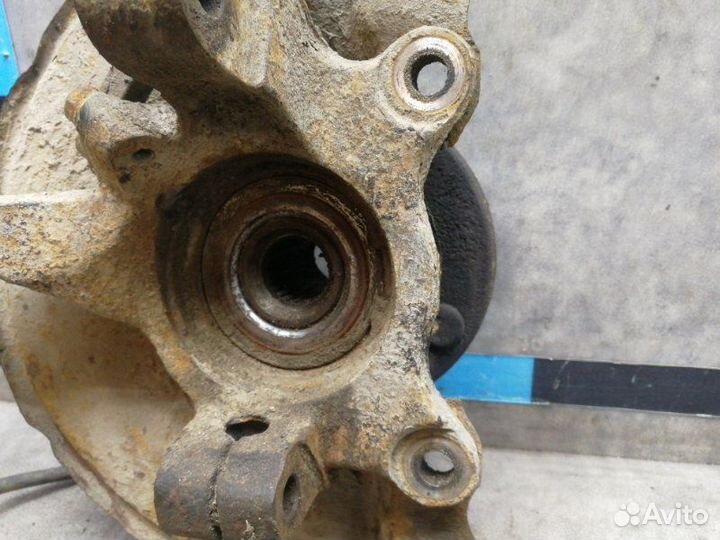 Кулак поворотный передний левый Mitsubishi Lancer