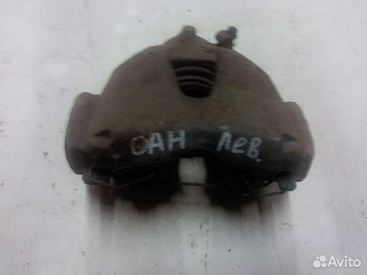 Суппорт передний левый Opel Astra H