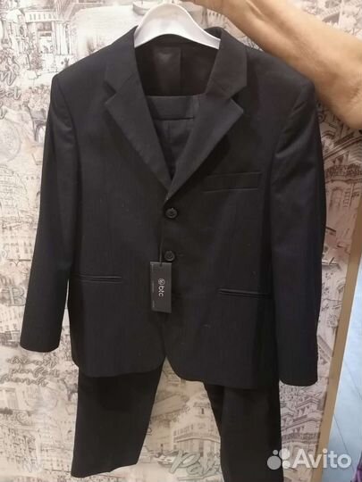 Новый костюм размер 134 см