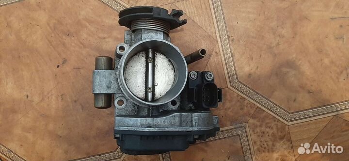 Дроссельная заслонка Volkswagen Polo 06a133064d