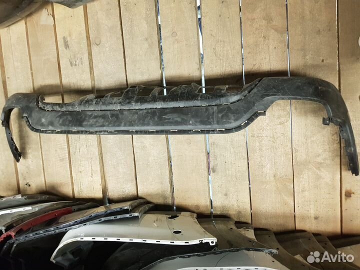 Спойлер (нижняя часть) бампера заднего Kia Rio