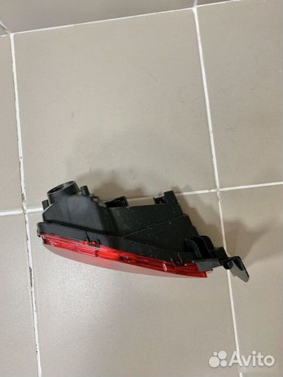 Фонарь противотуманный задний Toyota Fortuner