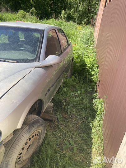 Зеркало на opel vectra б