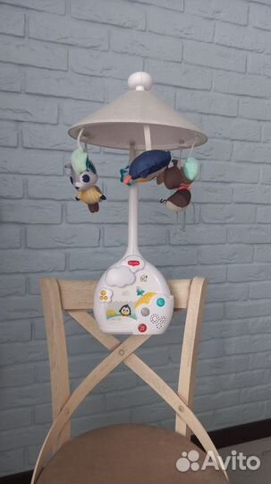 Мобиль на кроватку с проектором tiny love