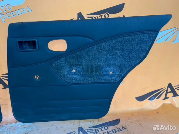 Обшивка боковой двери задняя Daewoo Nexia седан