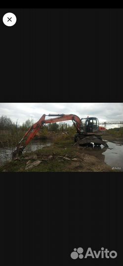 Машинист экскаватора колесного