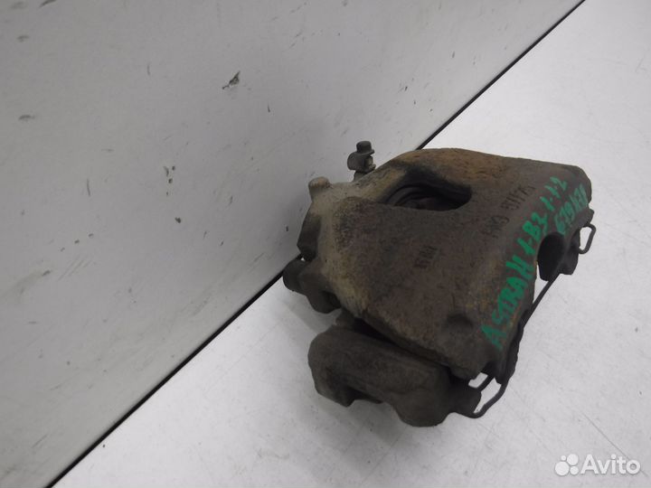 Суппорт тормозной передний левый Opel Astra H 2004