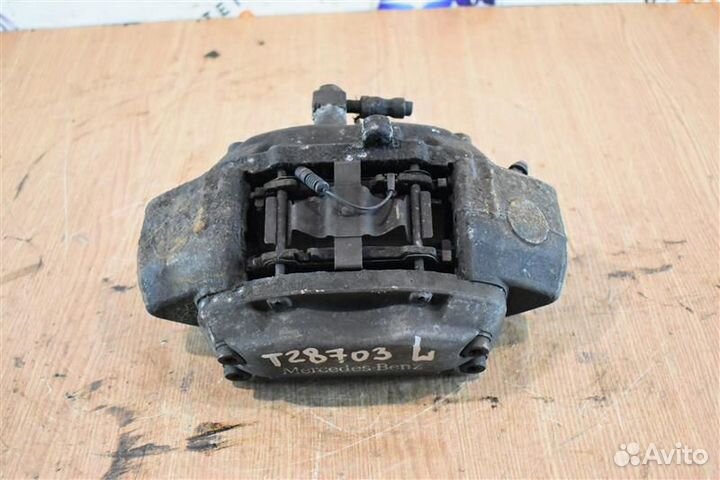 Суппорт тормозной передний левый Mercedes-Benz Ml