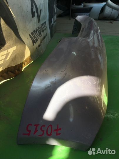 Бампер задний Toyota Vitz SCP10