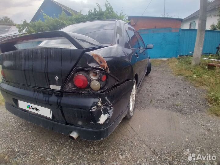 Mitsubishi Lancer 1.6 МТ, 2002, 27 000 км