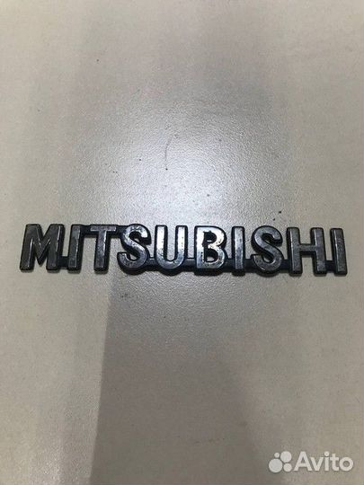Эмблема на крышку багажника м и т с у б и с и