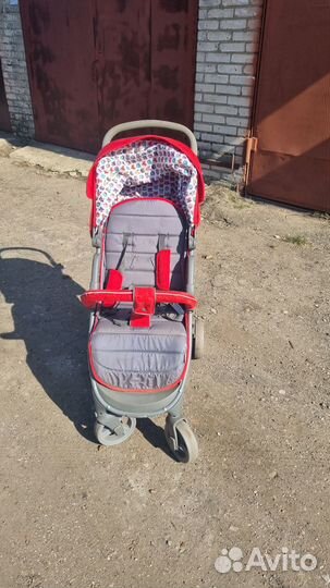 Детская прогулочная коляска Corol