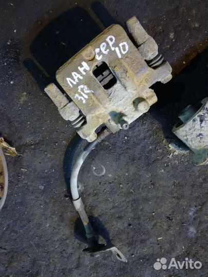 Суппорт диск тормозной задний Lancer 10 X Лансер