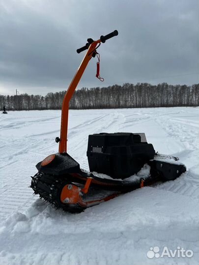 Мотосноуборд снежный