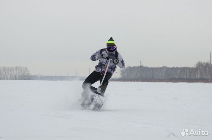 Мотосноуборд по снегу
