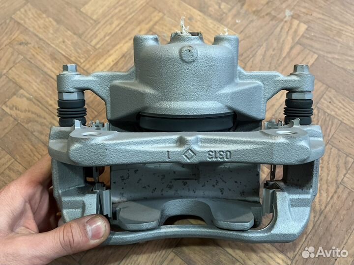 Суппорт тормозной Передний правый opel astra j