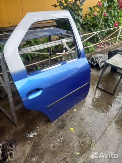 Двери на рено логан