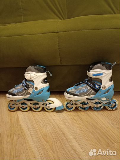 Коньки роликовые