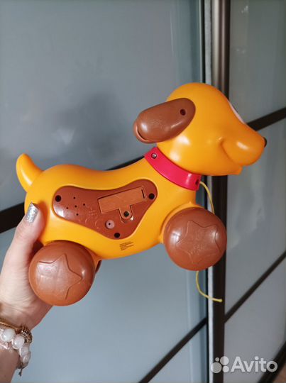 Собачка (игрушка на колёсиках)