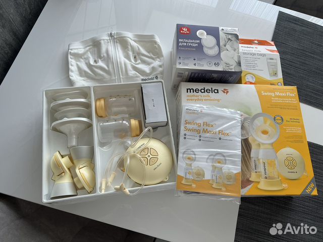 Двойной молокоотсос medela swing maxi flex с топом