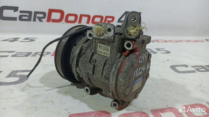 Компрессор кондиционера б/у для Kia Shuma (1204001