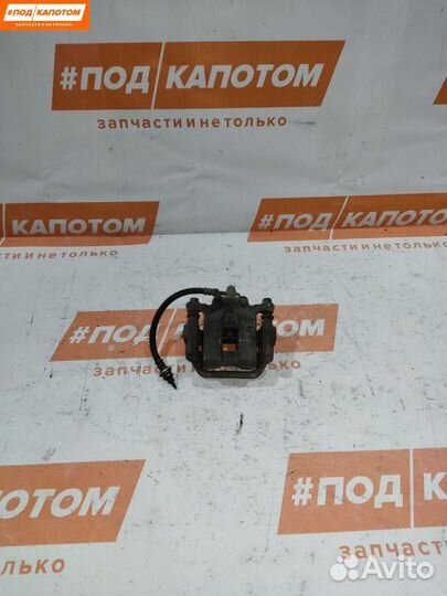 Суппорт тормозной задний левый Nissan X-Trail T31