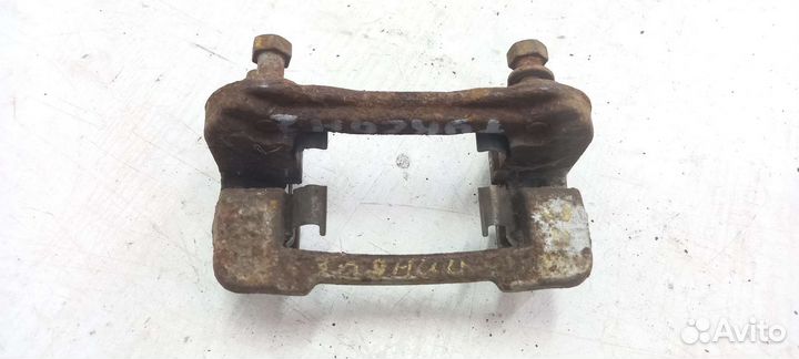 Скоба суппорта заднего Hyundai Tucson 2