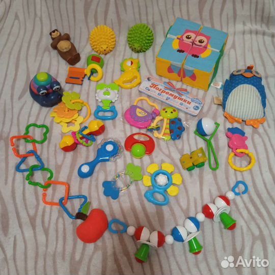 Развивающие игрушки погремушки