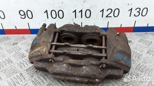 Суппорт тормозной передний правый toyota land crui