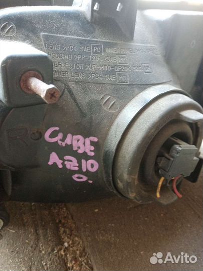 Фара Nissan Cube