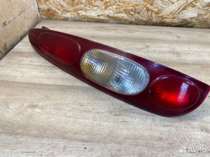 Фонарь задний левый Kia Clarus универсал 1.8 I 16V