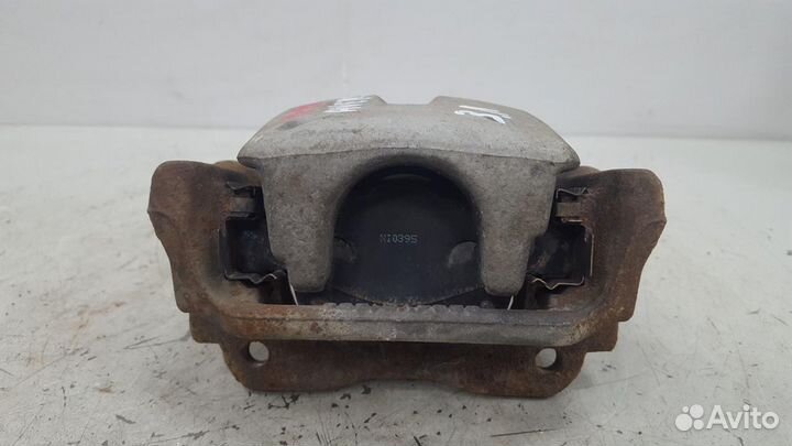 Тормозной суппорт задний левый Toyota Avensis 2